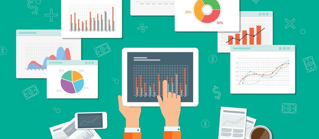 varios graficos em cima de uma mesa